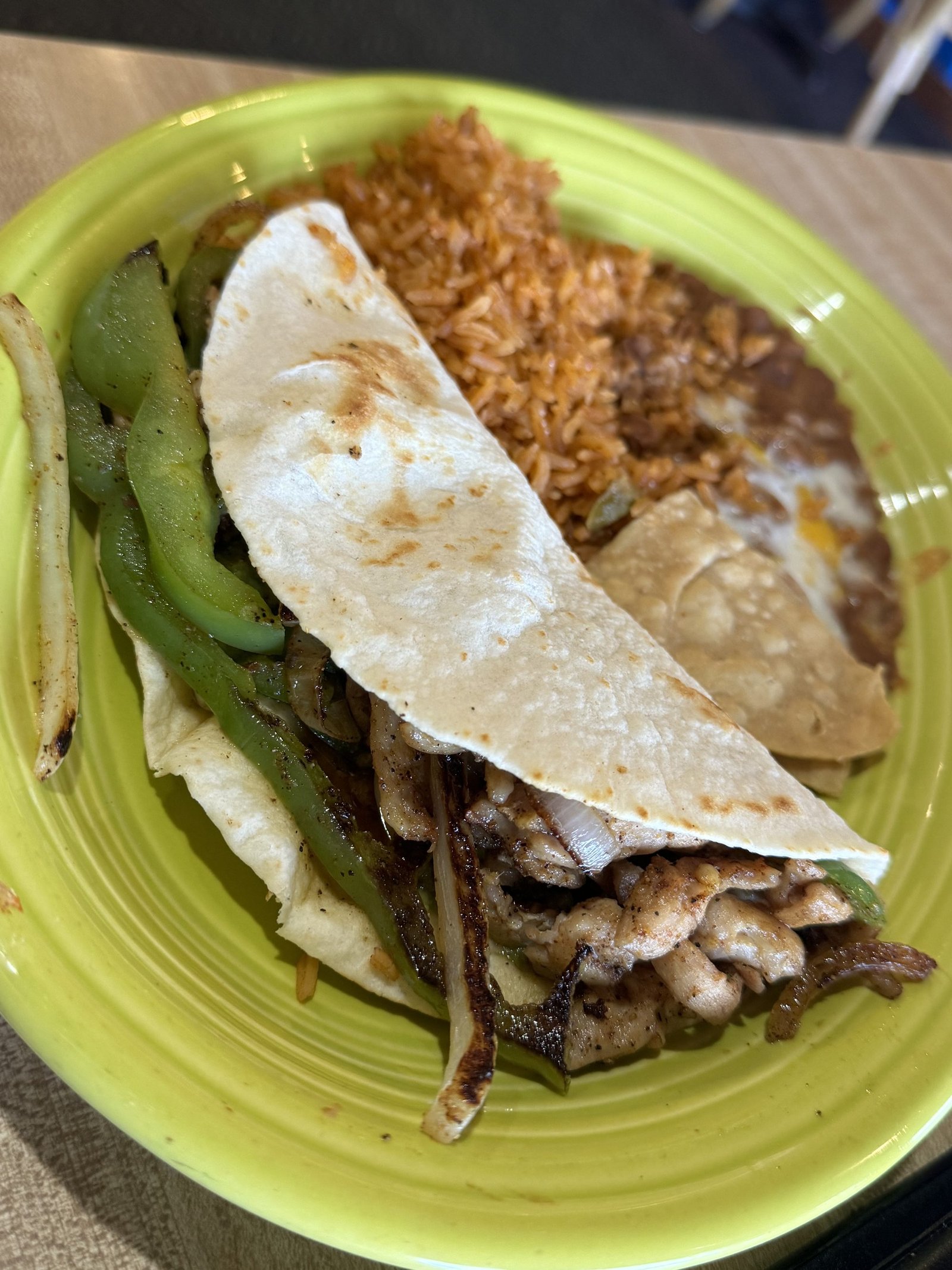 Fajitas with flour tortillas, rice and beans