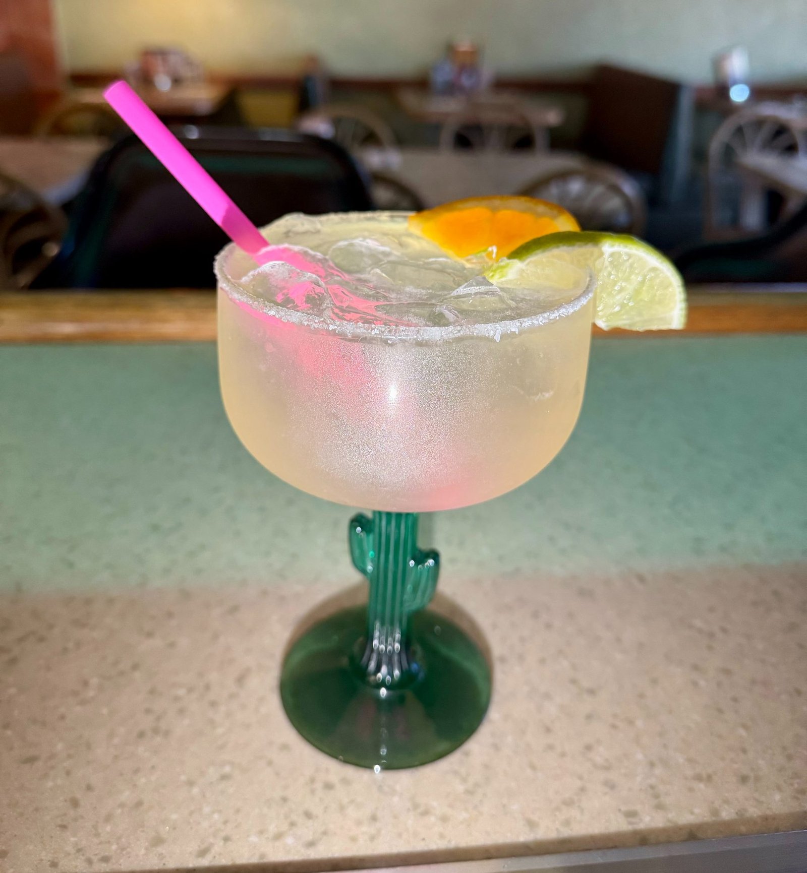 Margarita served in a glass with a cactus stem